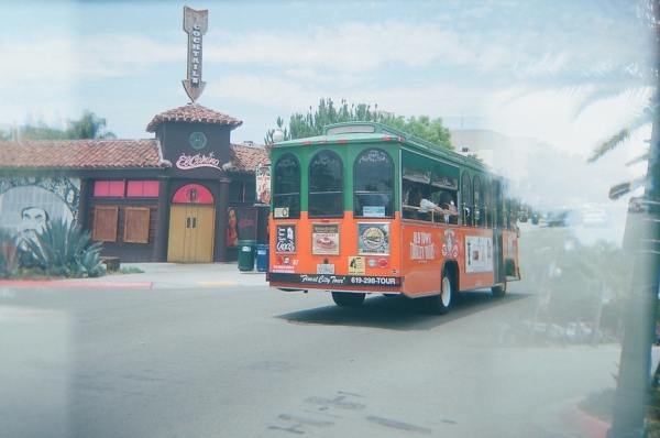 The Old Town Trolley rolls past El Camino on India Street